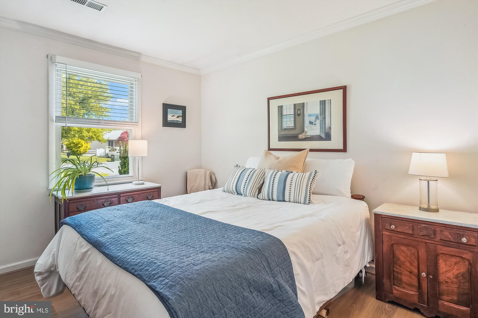 204 McKay Road Stevensville, MD 21666 - Photo 17 of 31 a bedroom with a bed and a window