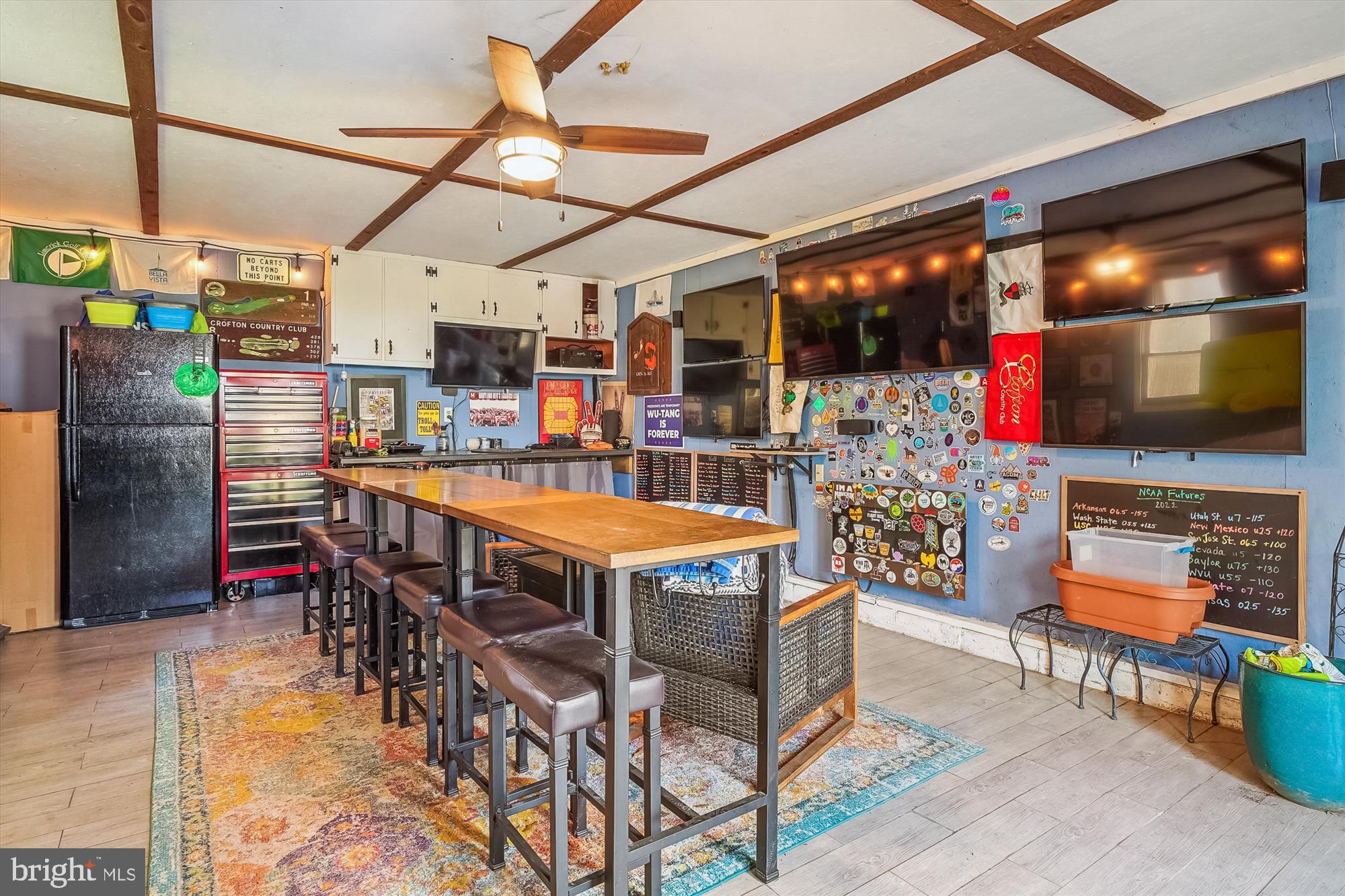 204 McKay Road Stevensville, MD 21666 - Photo 25 of 31 a dining room with a table and chairs