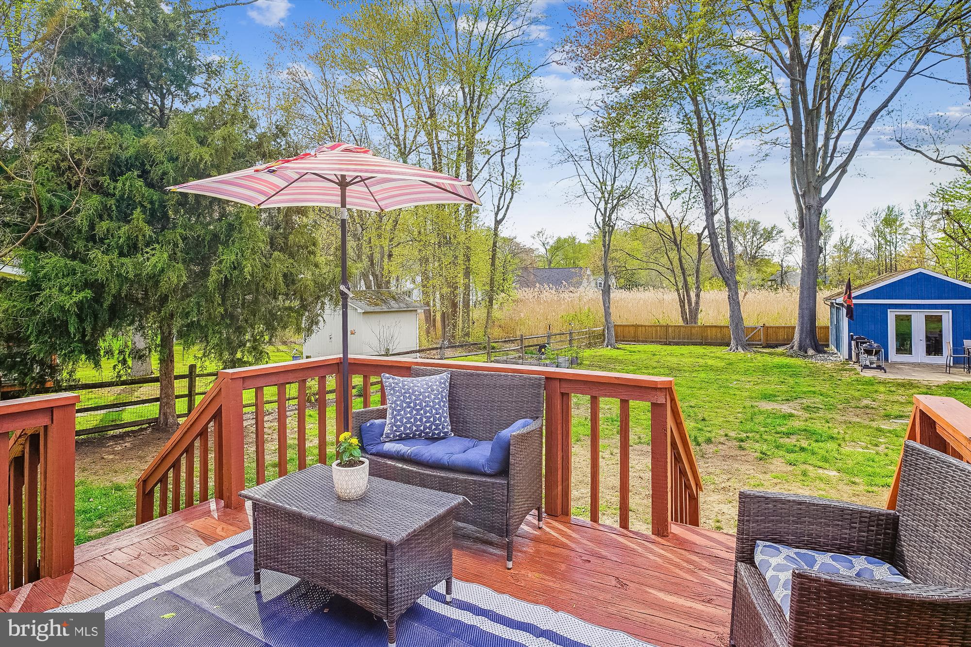 204 McKay Road Stevensville, MD 21666 - Photo 30 of 31 a view of a deck with furniture and a yard