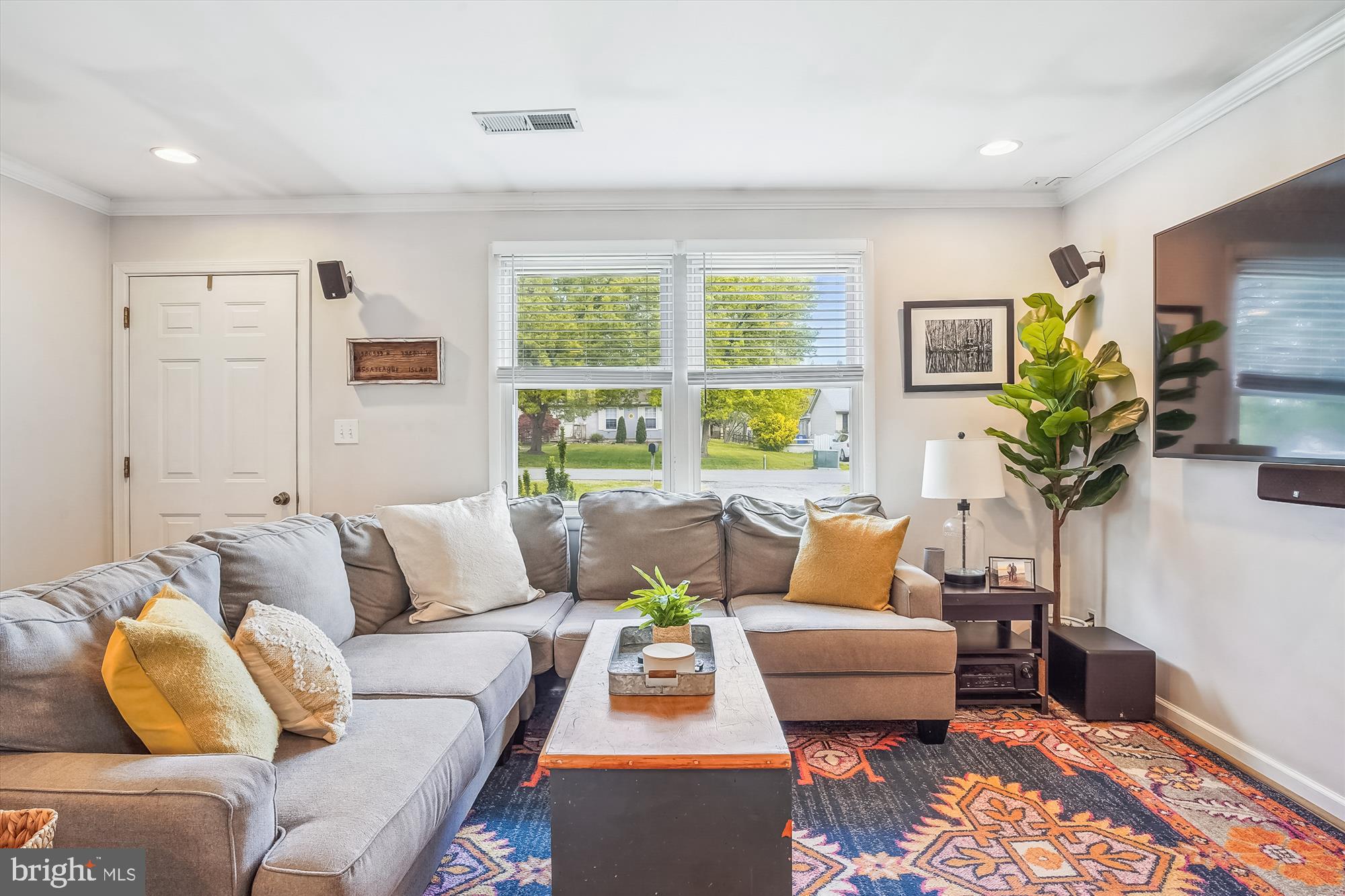 204 McKay Road Stevensville, MD 21666 - Photo 6 of 31 a living room with furniture and a large window