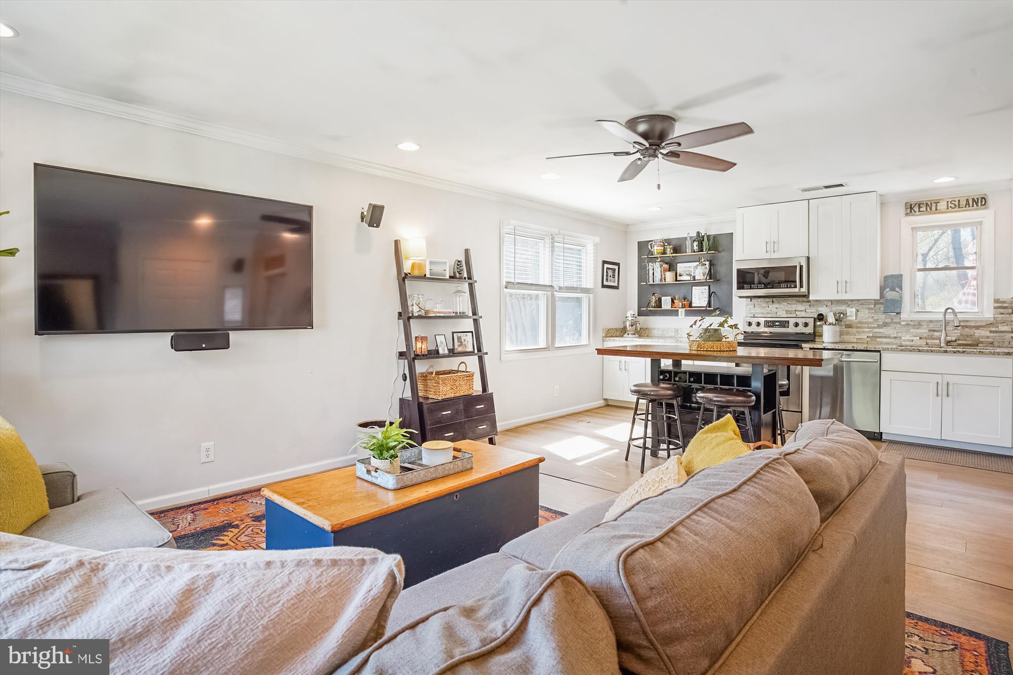 204 McKay Road Stevensville, MD 21666 - Photo 9 of 31 a living room with furniture and a flat screen tv