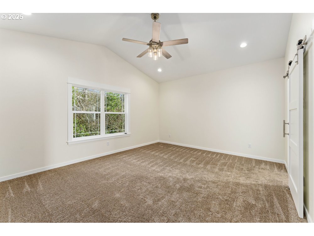 1241 Lighthouse Lane Brookings, OR 97415 - Photo 20 of 32 a view of an empty room with a window