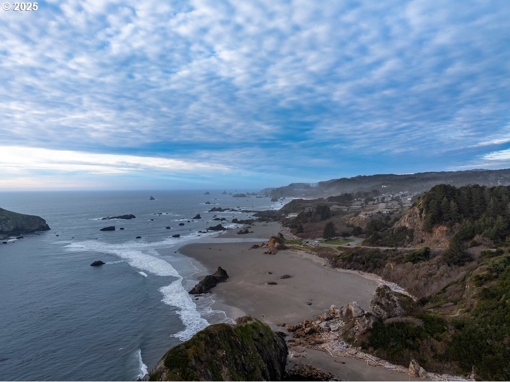 1241 Lighthouse Lane Brookings, OR 97415 - Photo 31 of 32 a view of beach and mountain