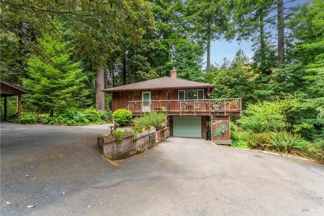 a house view with a garden space