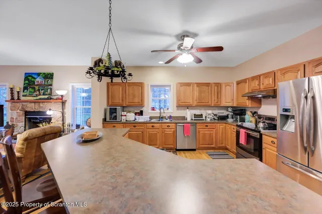 a spacious bedroom with a bed and a window