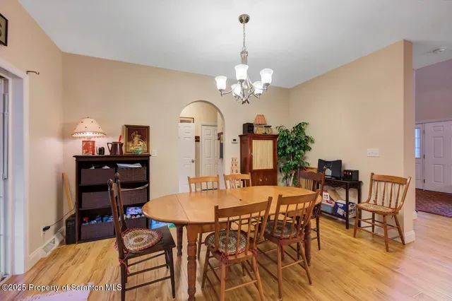 a bathroom with a sink a toilet and a shower