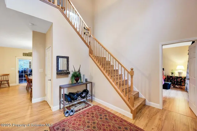 a spacious bathroom with a double vanity sink toilet and a shower