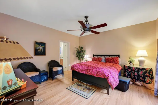 a en suite bathroom with a sink and a mirror