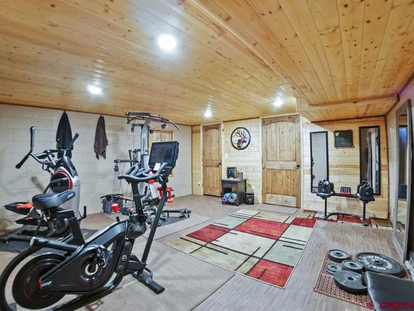 a view of living room with furniture and flat screen tv