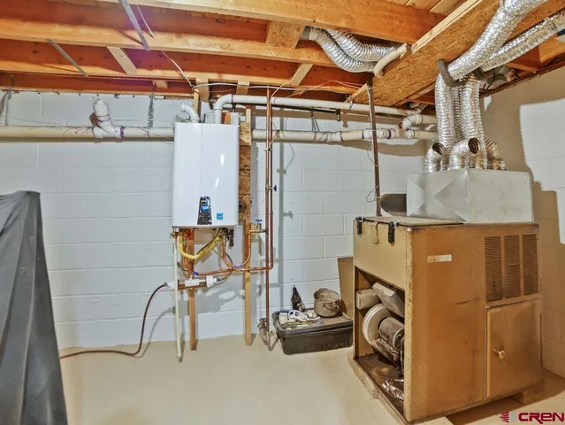 a view of living room with furniture and flat screen tv