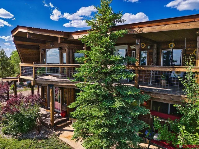 front view of house with a potted plant