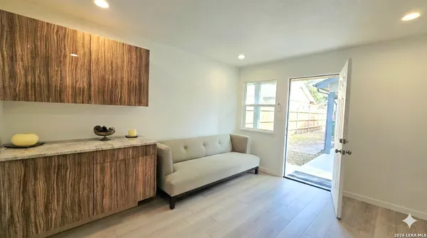 a living room with furniture and a window