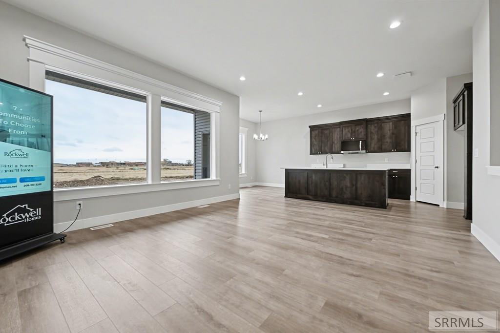 472 Spruce Way Rigby, ID 83442 - Photo 2 of 15 Great Room to Kitchen/Dining Area