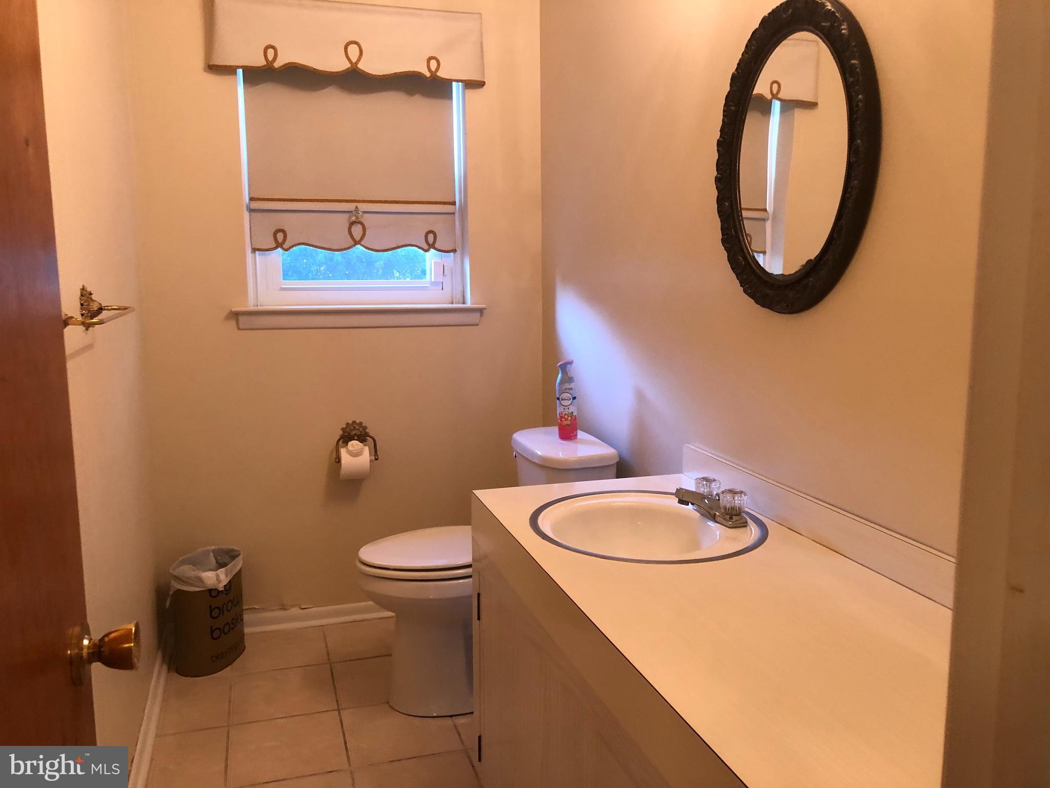 8701 Autumn Road Philadelphia, PA 19115 - Photo 8 of 55 Large First Floor Powder Room to Right of Foyer