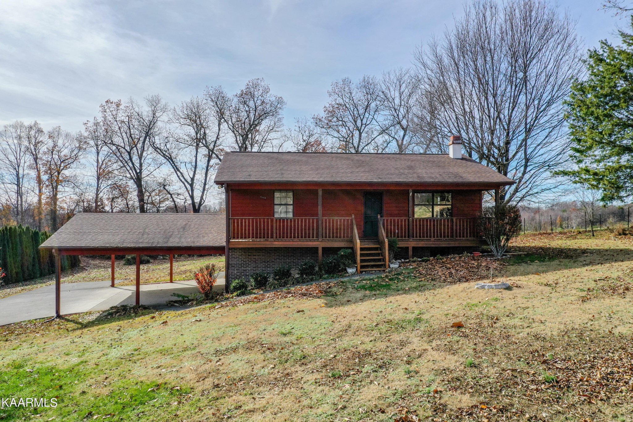 913 Mt Lebanon Road Maryville, TN 37804 - Photo 1 of 33 a view of a house with a yard and sitting area