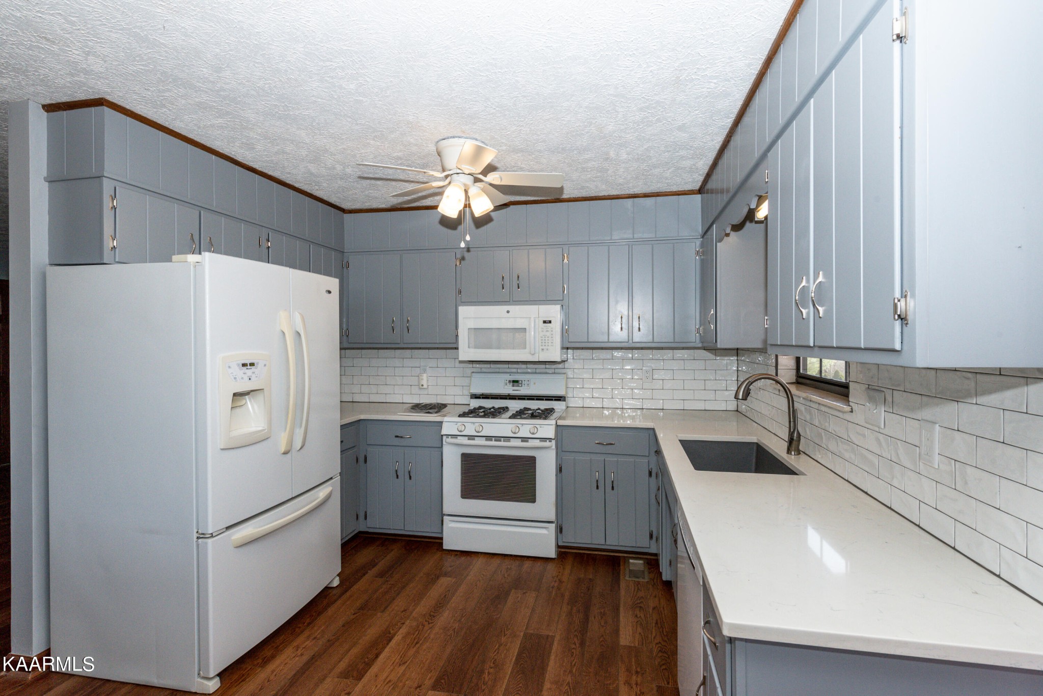 913 Mt Lebanon Road Maryville, TN 37804 - Photo 12 of 33 a kitchen with a refrigerator a sink and dishwasher