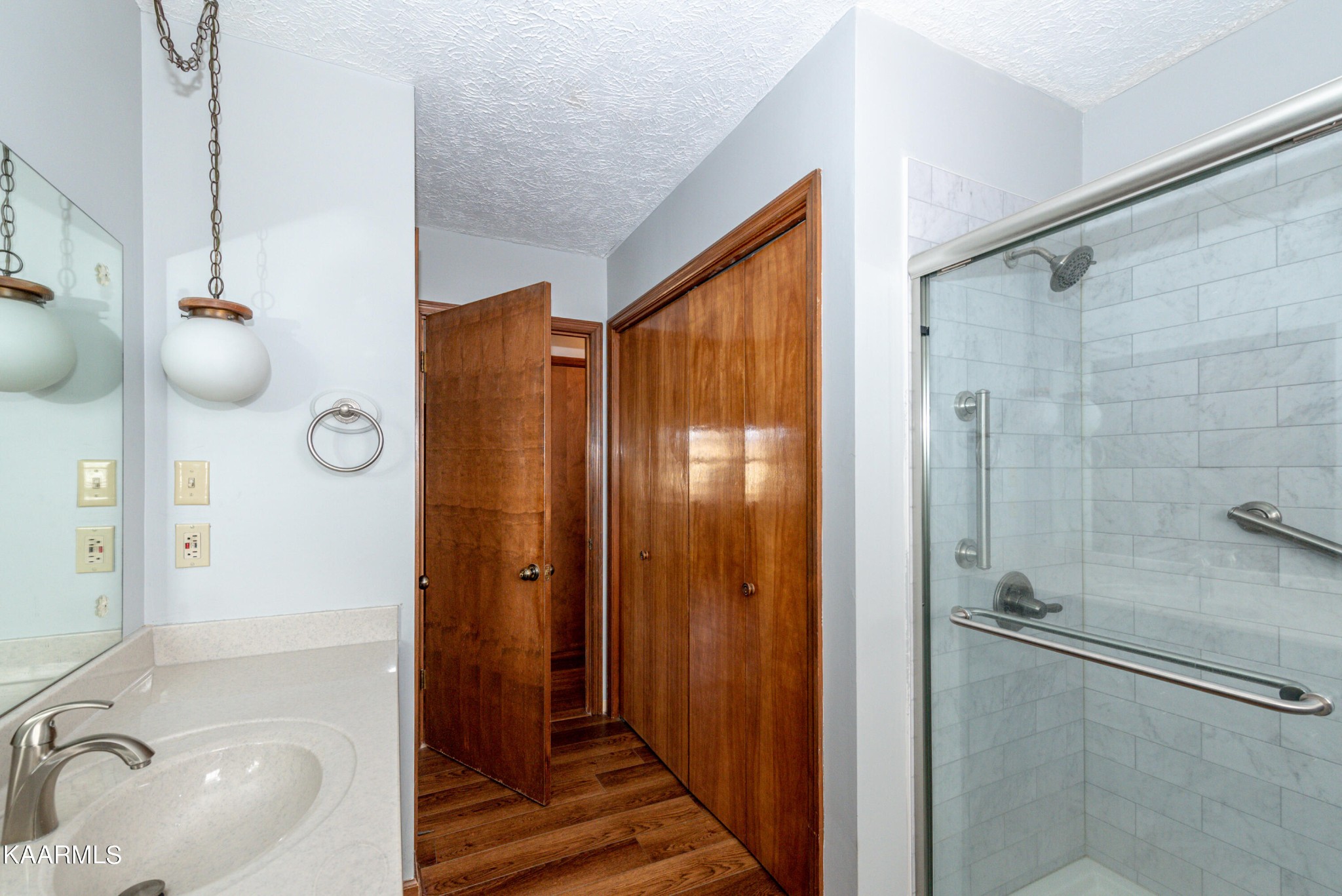913 Mt Lebanon Road Maryville, TN 37804 - Photo 16 of 33 a bathroom with a shower and a sink