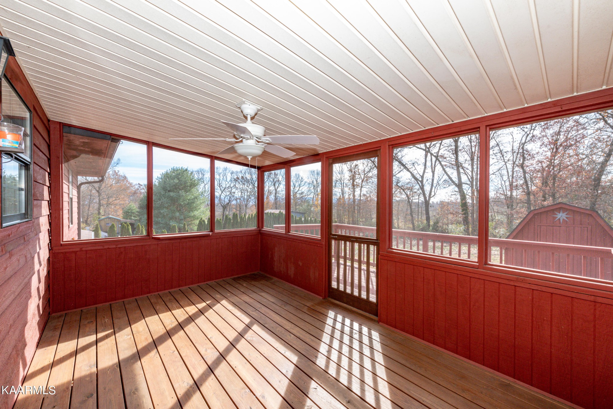913 Mt Lebanon Road Maryville, TN 37804 - Photo 22 of 33 a view of empty room with wooden floor and floor to ceiling window