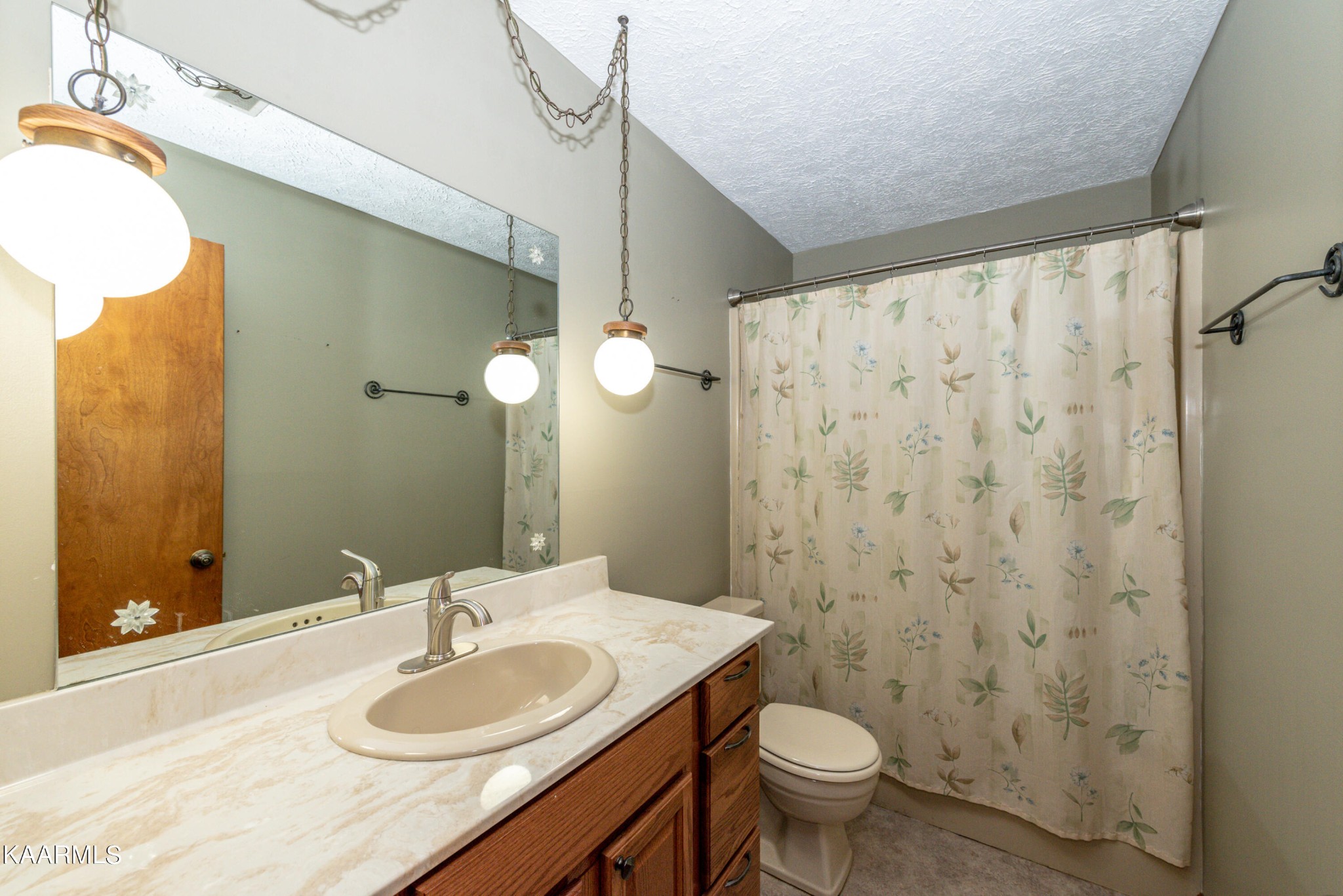 913 Mt Lebanon Road Maryville, TN 37804 - Photo 23 of 33 a bathroom with a granite countertop sink toilet and a mirror