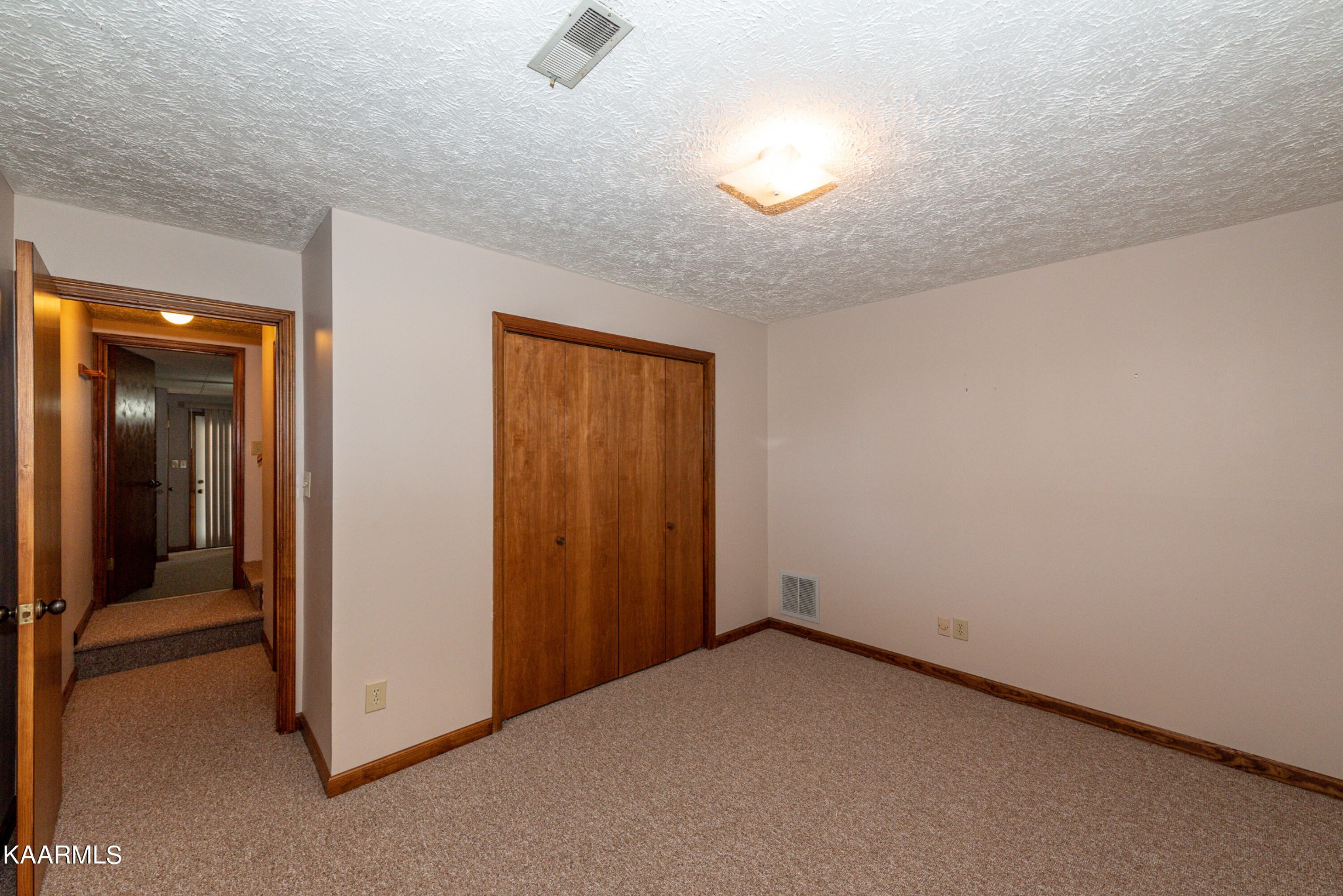 913 Mt Lebanon Road Maryville, TN 37804 - Photo 25 of 33 an empty room with a empty space and windows