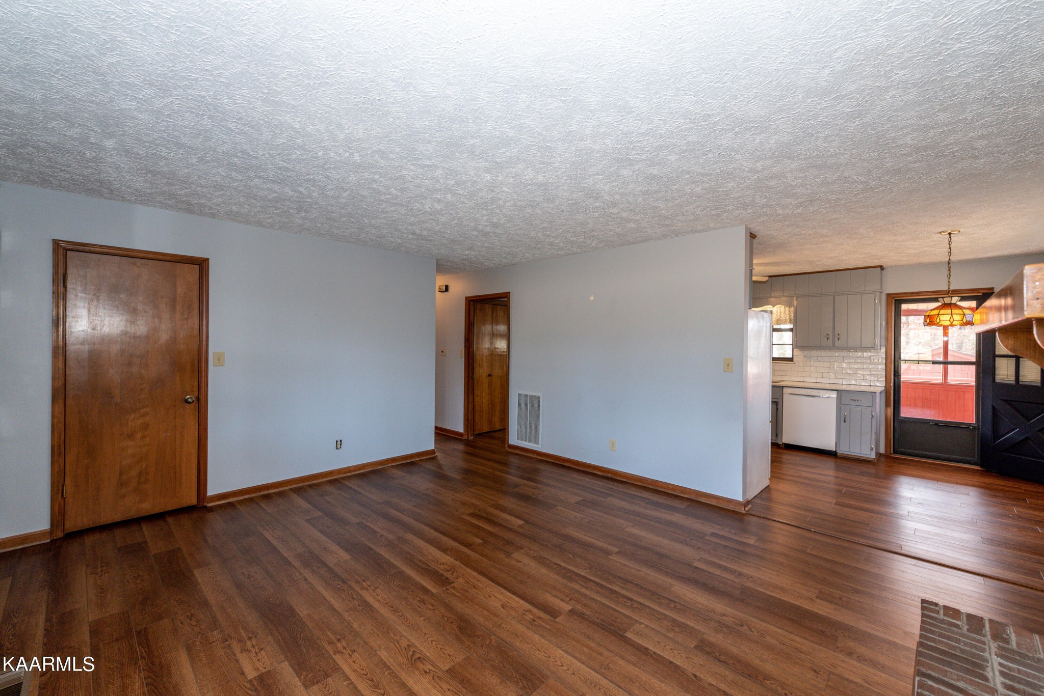 913 Mt Lebanon Road Maryville, TN 37804 - Photo 10 of 33 a view of empty room with wooden floor and window