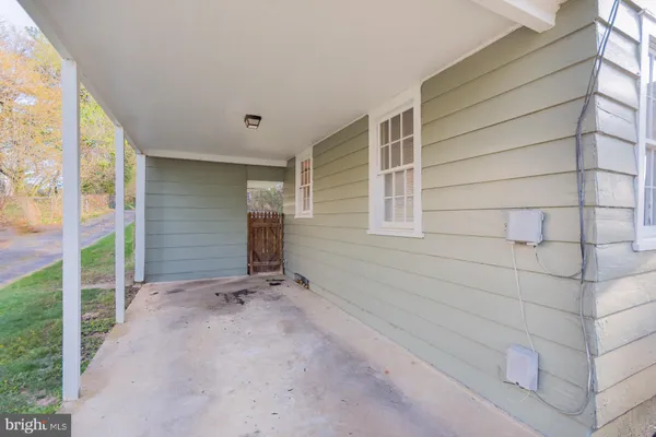 a view of a back yard of the house