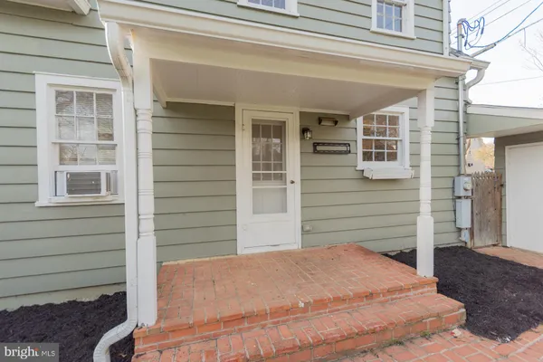 a backyard of a house with seating space