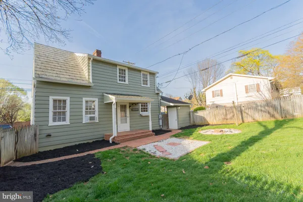 a view of a bathroom from a hallway