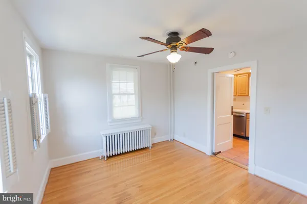 a kitchen with stainless steel appliances a stove a microwave and cabinets