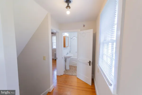 a view of an empty room with a window