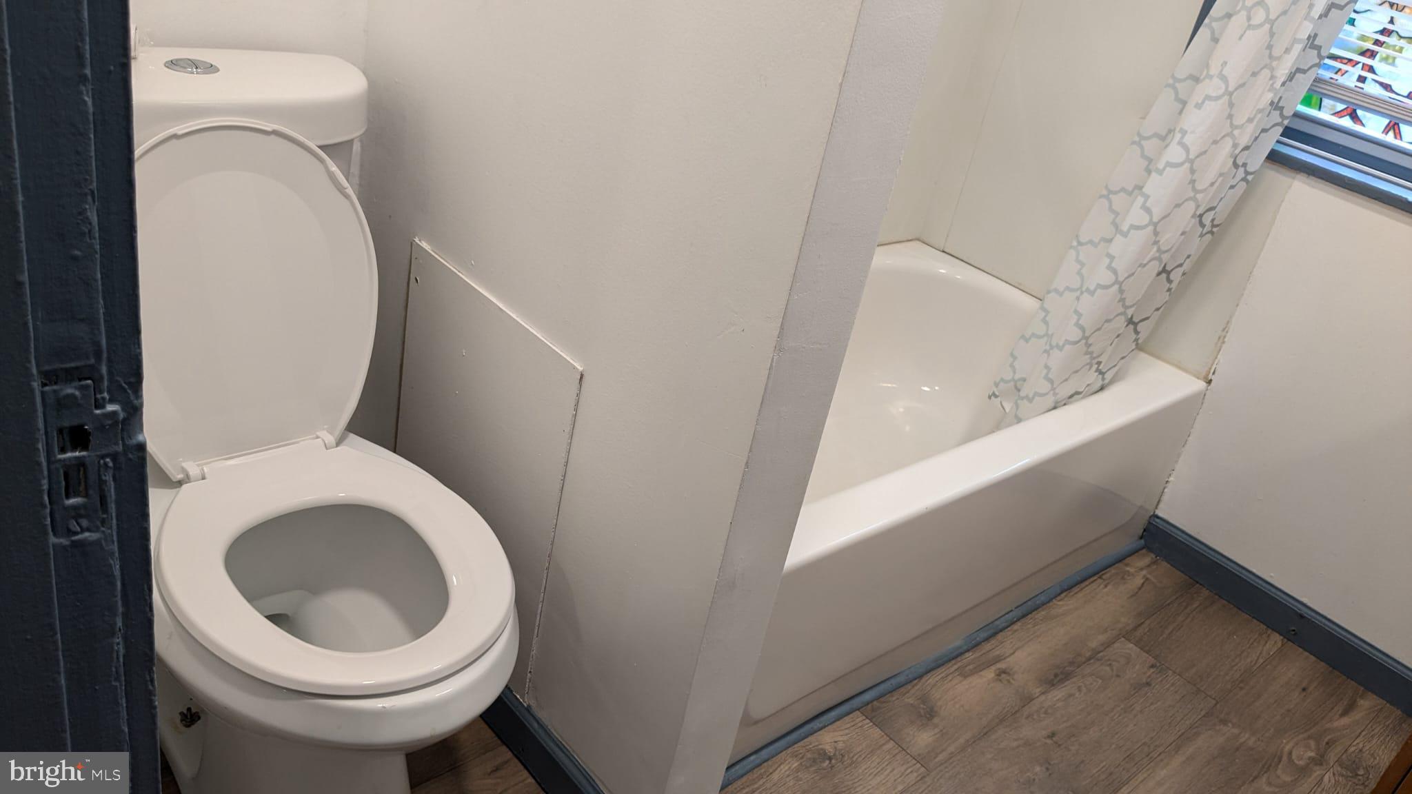 2909 Yorkship Road Camden, NJ 08104 - Photo 19 of 24 a bathroom with a toilet and a sink