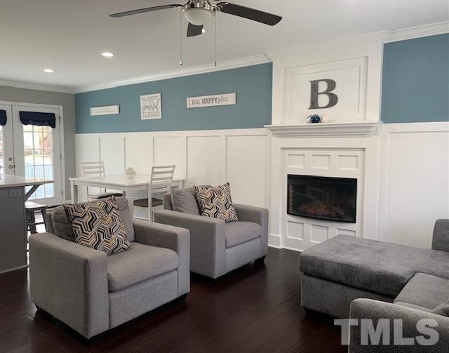 4208 Traders Dock Court Raleigh, NC 27616 - Photo 3 of 9 a living room with furniture and a fireplace