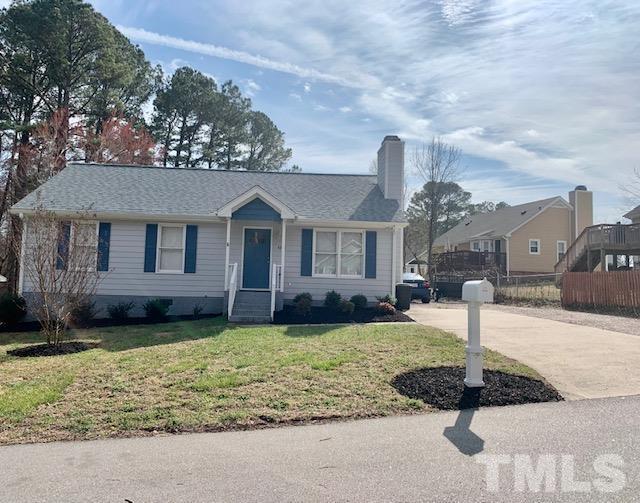 4208 Traders Dock Court Raleigh, NC 27616 - Photo 5 of 9 a front view of a house with garden