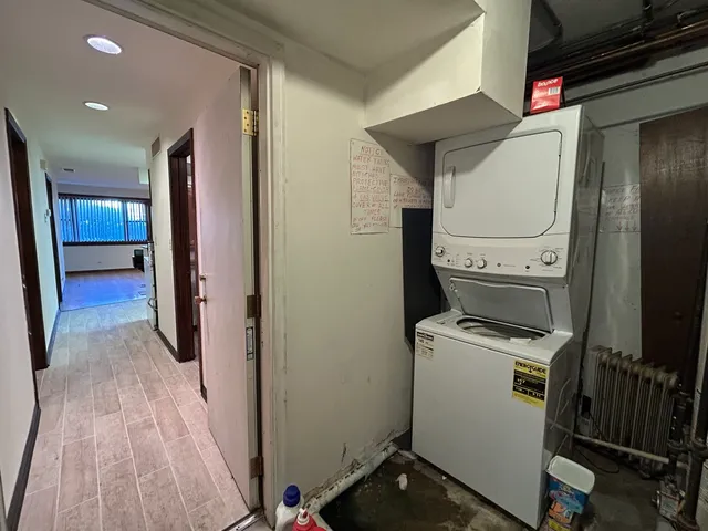 a view of a storage & utility room with washer and dryer