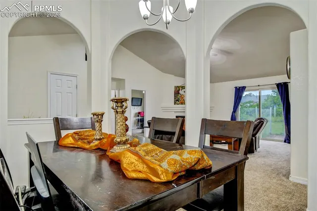 a living room with furniture fireplace and flat screen tv