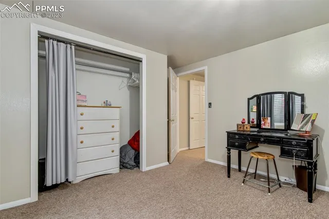 a view of a workspace with furniture