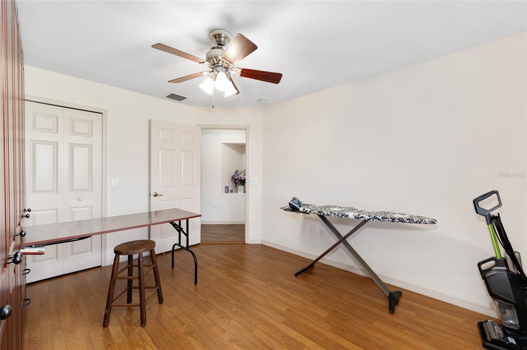 15694 Southwest 16th Avenue Road Ocala, FL 34473 - Photo 26 of 42 a view of a room with furniture and wooden floor