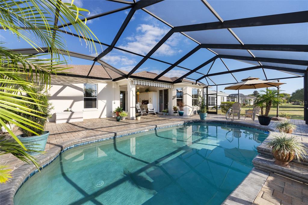 15694 Southwest 16th Avenue Road Ocala, FL 34473 - Photo 35 of 42 a view of a swimming pool with a patio
