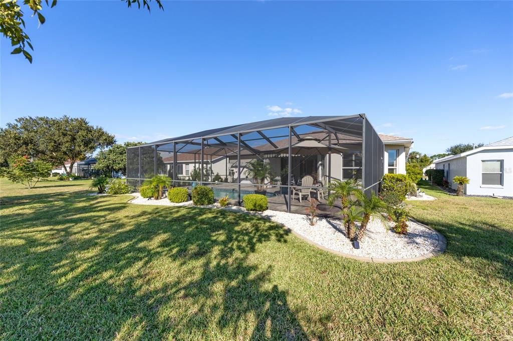 15694 Southwest 16th Avenue Road Ocala, FL 34473 - Photo 39 of 42 a view of a house with backyard and sitting area