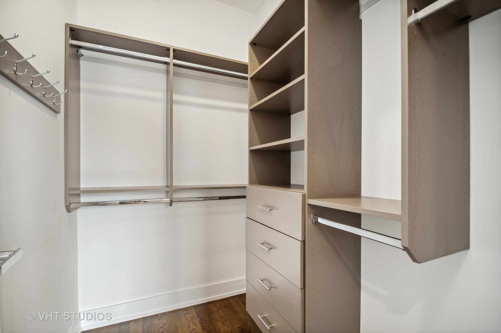 1741 West Roscoe Street, Unit 2 Chicago, IL 60657 - Photo 19 of 24 a view of walk in closet with empty racks