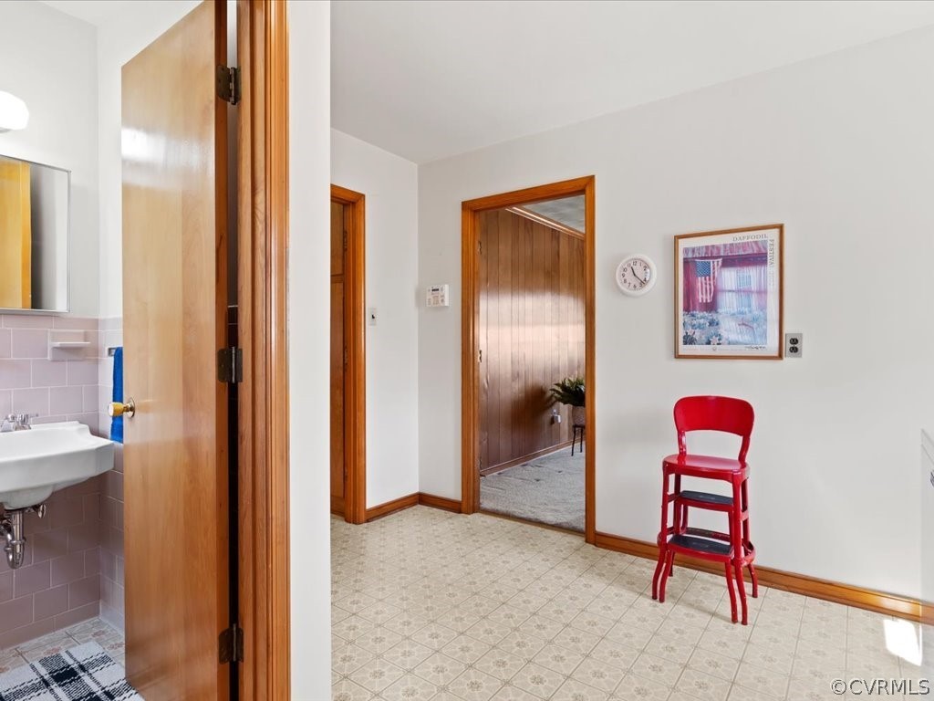 6401 Commander Road Richmond, VA 23224 - Photo 15 of 19 a view of a hallway with workspace