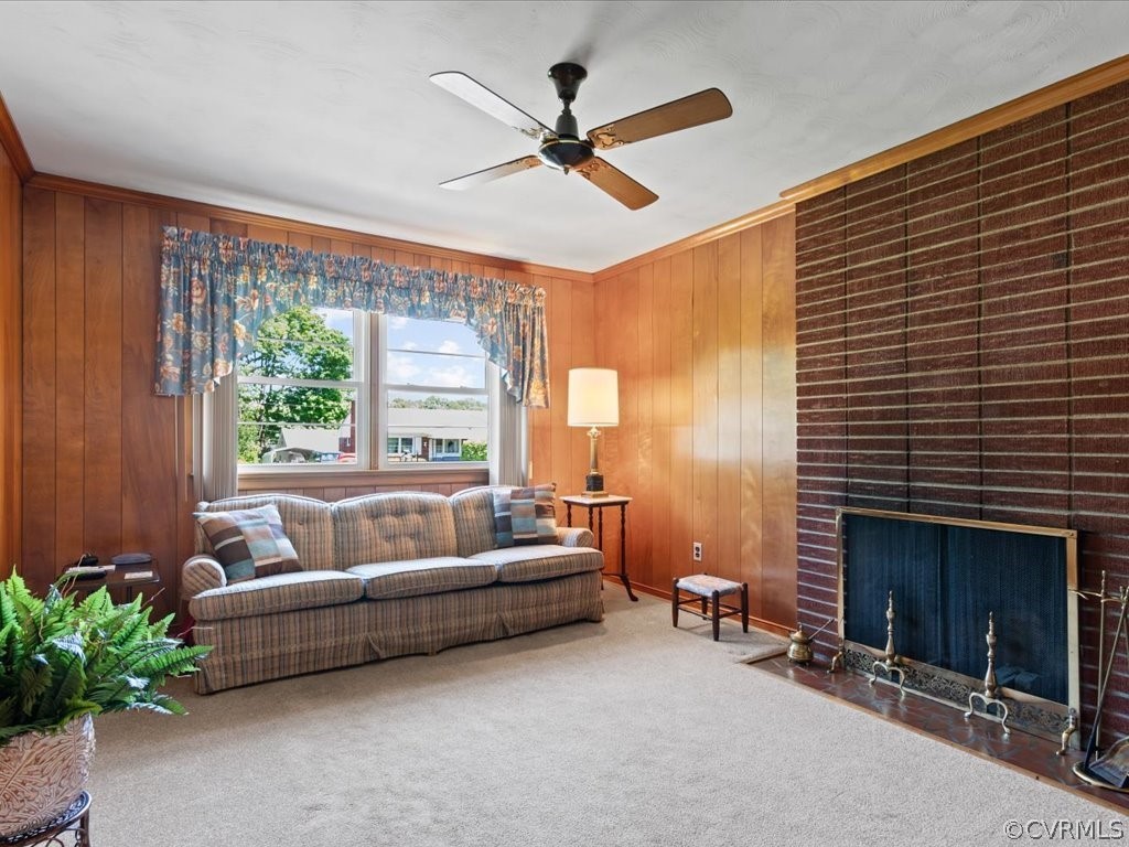 6401 Commander Road Richmond, VA 23224 - Photo 17 of 19 a living room with furniture and a fireplace