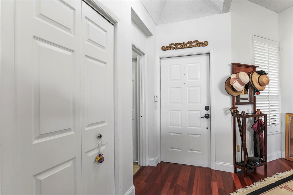 7535 La Paz Boulevard, Unit 301 Boca Raton, FL 33433 - Photo 12 of 42 a view of hallway with wooden floor