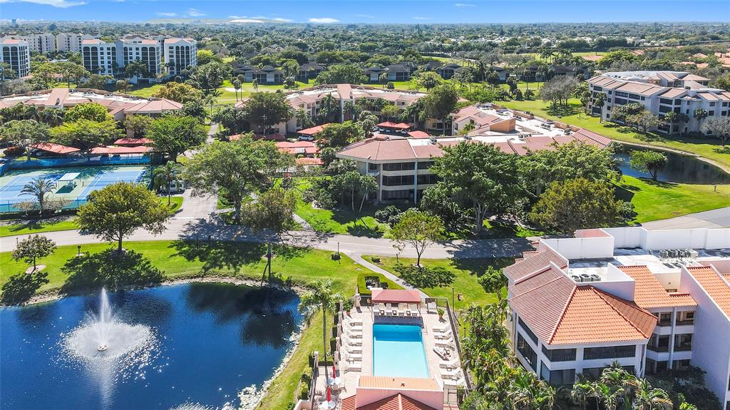 7535 La Paz Boulevard, Unit 301 Boca Raton, FL 33433 - Photo 37 of 42 a view of a lake with a lot of houses
