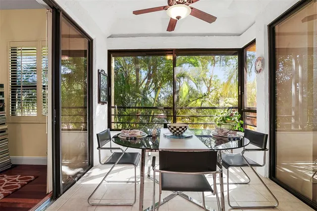 a living room with large windows
