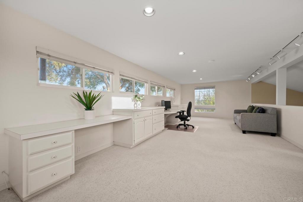 2469 East Mission Road Fallbrook, CA 92028 - Photo 13 of 32 a living room with furniture and a couch