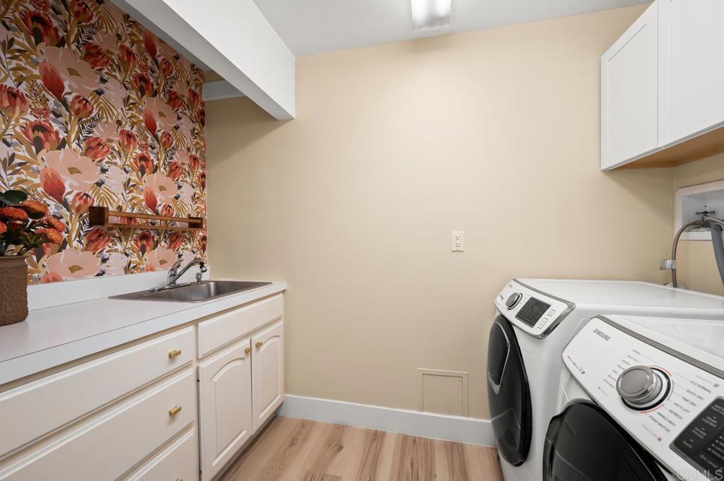 2469 East Mission Road Fallbrook, CA 92028 - Photo 17 of 32 a utility room with dryer and washer