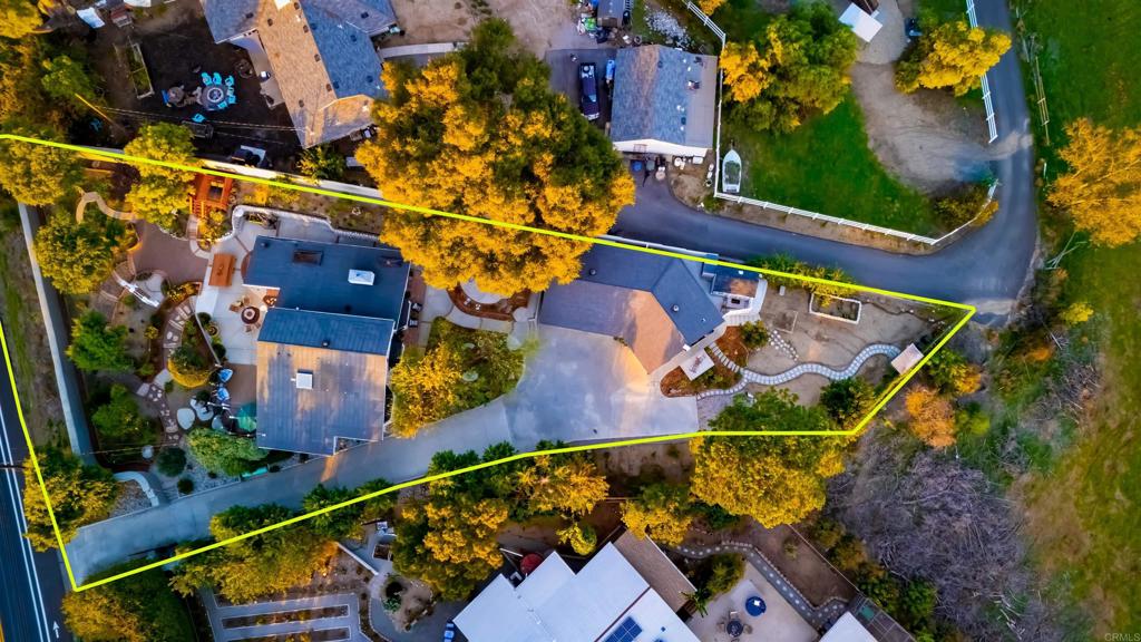 2469 East Mission Road Fallbrook, CA 92028 - Photo 21 of 32 an aerial view of a house a yard and outdoor seating
