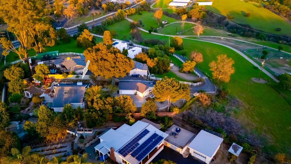 2469 East Mission Road Fallbrook, CA 92028 - Photo 22 of 32 an aerial view of residential house with outdoor space and swimming pool