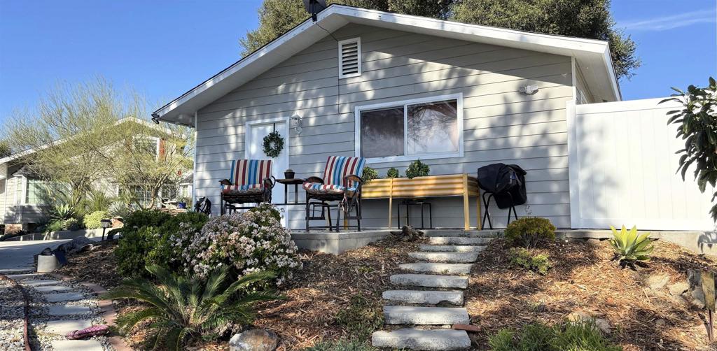 2469 East Mission Road Fallbrook, CA 92028 - Photo 29 of 33 a front view of house with yard outdoor seating and barbeque oven